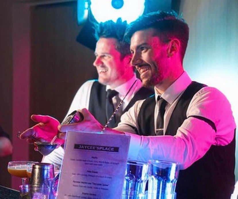Cocktailhire bartenders working a guest-facing bar during a live event