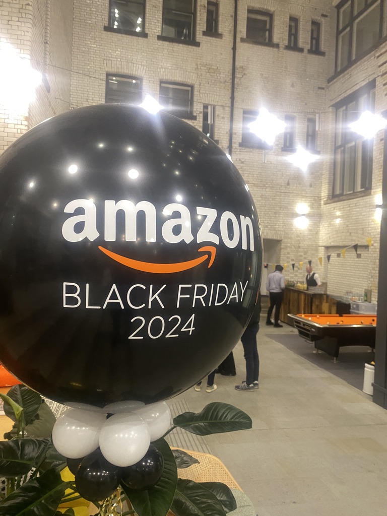Amazon branded event decor with Cocktailhire bar service in the background